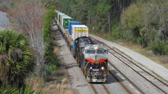 Central of Georgia heritage unit pulls intermodal freight